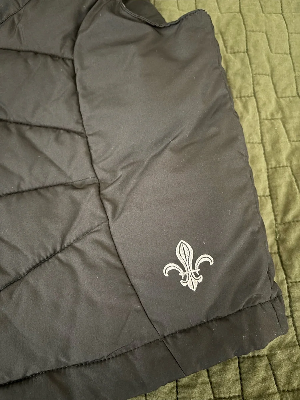 Columbia Kids Black Hooded Vest with Silver Lining and fleur-de-lis.
